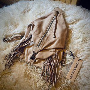 LED TO BELIEVE Minji Multi Backpack Fringe NWT *